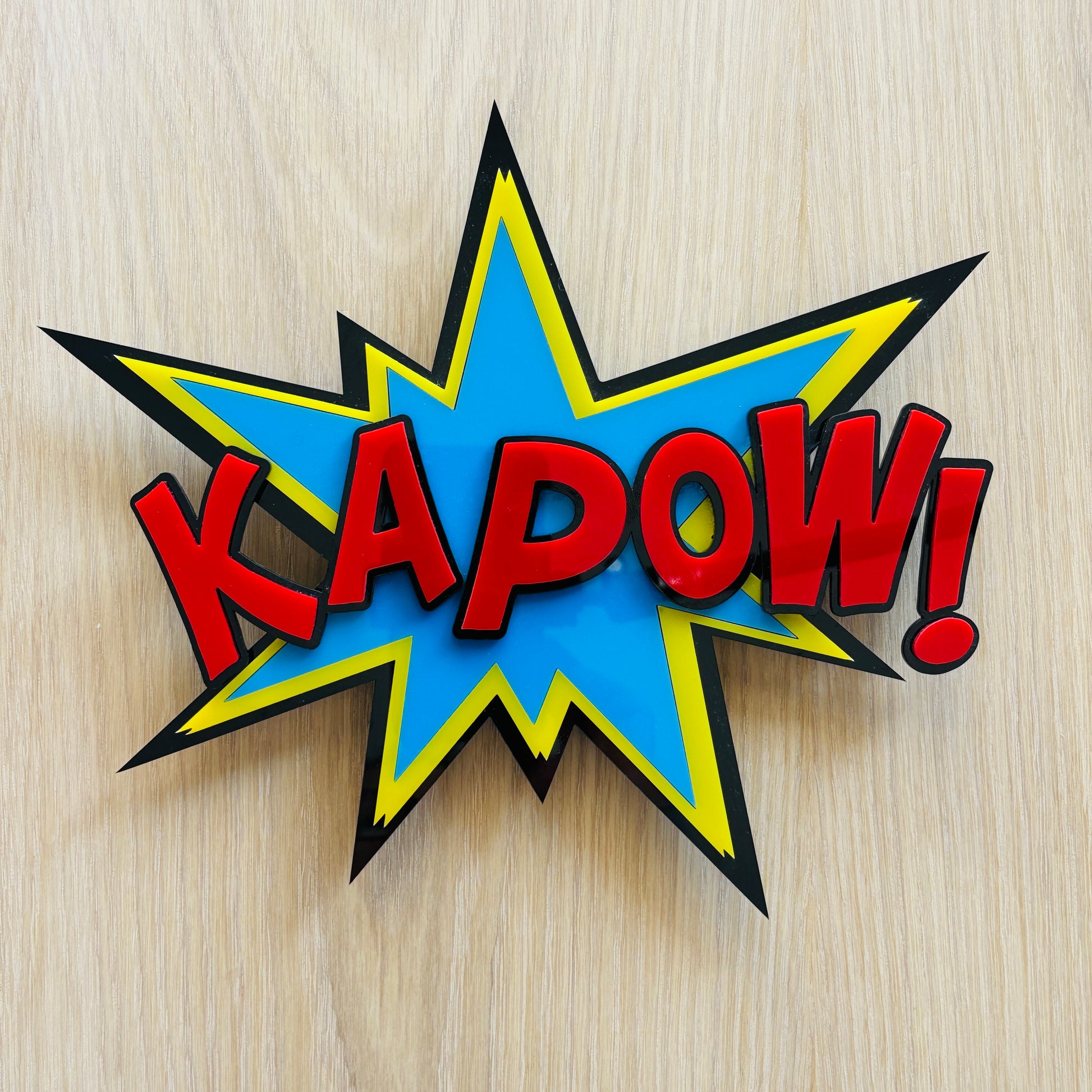 Comic-style 'KAPOW!' logo